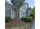 A charming exterior view of the home displays well-maintained landscaping and gray siding at 278 Mission Oak Se Dr, Grayson, GA 30017