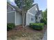Charming home exterior with green landscaping and gray siding with white trim at 278 Mission Oak Se Dr, Grayson, GA 30017