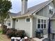 Home exterior with gray siding, white trim, and an outdoor grill on the patio at 278 Mission Oak Se Dr, Grayson, GA 30017