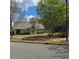 Cozy home with well-maintained lawn, mature trees, and inviting curb appeal at 278 Mission Oak Se Dr, Grayson, GA 30017