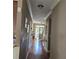 Welcoming hallway with hardwood floors and neutral wall color at 278 Mission Oak Se Dr, Grayson, GA 30017
