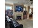 Inviting living room with a fireplace, built-in bookcases, and plenty of seating at 278 Mission Oak Se Dr, Grayson, GA 30017