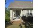 Covered patio with comfortable seating, perfect for relaxing outdoors at 278 Mission Oak Se Dr, Grayson, GA 30017