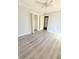 Cozy bedroom with vinyl floors, neutral paint, and a ceiling fan at 1445 Diplomat Dr, Riverdale, GA 30296