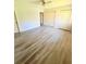 Spacious bedroom with vinyl floors, neutral paint, and closet space at 1445 Diplomat Dr, Riverdale, GA 30296