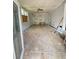 Sun room with tile flooring, ceiling fan and lots of natural light at 1445 Diplomat Dr, Riverdale, GA 30296