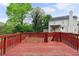 Fenced backyard with access to the home's deck at 1647 Imperial Ct, Norcross, GA 30093