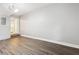 Spacious bedroom with hardwood floors and neutral walls at 1647 Imperial Ct, Norcross, GA 30093