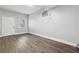 Cozy bedroom with hardwood floors, neutral walls, and ample natural light at 1647 Imperial Ct, Norcross, GA 30093