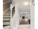 Inviting entryway showcasing hardwood floors, staircase, and a glimpse into the cozy living room at 1647 Imperial Ct, Norcross, GA 30093