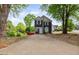 Charming two-story home featuring a well-maintained yard and inviting curb appeal on a sunny day at 1647 Imperial Ct, Norcross, GA 30093