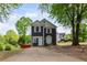 Charming two-story home featuring a well-maintained yard and inviting curb appeal on a sunny day at 1647 Imperial Ct, Norcross, GA 30093