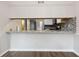Bright kitchen features granite countertops and modern stainless steel appliances at 1647 Imperial Ct, Norcross, GA 30093