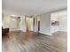 Open-concept living space with hardwood floors, leading to the kitchen and entryway at 1647 Imperial Ct, Norcross, GA 30093