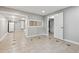 Open living space with neutral colors and access to other rooms at 1647 Imperial Ct, Norcross, GA 30093
