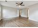 Large main bedroom with ceiling fan and two closets has attached bathroom at 1647 Imperial Ct, Norcross, GA 30093