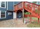 Concrete patio and stairway that leads to the wood deck with access to the main house at 1647 Imperial Ct, Norcross, GA 30093