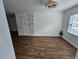 Bright dining room with wood floors and modern decor with natural light at 173 Amherst Nw Pl, Atlanta, GA 30327