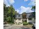 Inviting two-story apartment complex featuring well-maintained landscaping and a private balcony at 173 Amherst Nw Pl, Atlanta, GA 30327