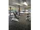 Well-equipped gym with weight machines and natural light and pool view at 173 Amherst Nw Pl, Atlanta, GA 30327