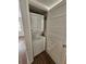 Laundry area with stackable washer and dryer in a closet at 173 Amherst Nw Pl, Atlanta, GA 30327