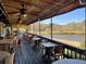 Outdoor patio seating with a view of a pond and open sky at 173 Amherst Nw Pl, Atlanta, GA 30327