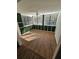 Bright sunroom with many windows, accent walls, and natural light at 173 Amherst Nw Pl, Atlanta, GA 30327