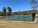 Community tennis courts on a sunny day, inviting an active lifestyle at 173 Amherst Nw Pl, Atlanta, GA 30327