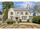 Charming traditional home with a stone-accented entryway, shutters, and well-maintained landscaping at 3114 Peachtree Ne Dr, Atlanta, GA 30305