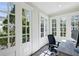 Bright office space filled with light from the many windows and featuring a desk and chair at 3114 Peachtree Ne Dr, Atlanta, GA 30305
