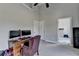 Bedroom with office setup and connected rooms, perfect for work and privacy at 3211 Thompson Mill Rd, Buford, GA 30519