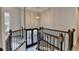 Foyer with hardwood floors, a modern chandelier, staircase and large windows for natural light at 3211 Thompson Mill Rd, Buford, GA 30519