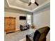 This main bedroom boasts tray ceilings, neutral walls, and a ceiling fan at 3211 Thompson Mill Rd, Buford, GA 30519