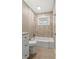 Beautiful full bathroom with tile surround tub, and updated fixtures at 1021 Magnolia Se Dr, Smyrna, GA 30082