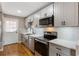 Beautiful renovated kitchen featuring stainless steel appliances and modern cabinets at 1021 Magnolia Se Dr, Smyrna, GA 30082