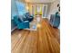 Inviting living room with large windows, hardwood floors and comfortable armchairs at 1021 Magnolia Se Dr, Smyrna, GA 30082