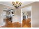Open-concept living space showcasing a stylish kitchen with hardwood floors at 1021 Magnolia Se Dr, Smyrna, GA 30082
