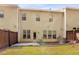 Backyard showcasing grass, a patio, privacy fence, and rear exterior at 1983 Silver Birch Se Dr, Smyrna, GA 30080