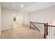 Upstairs loft featuring carpeted flooring and railing at 1983 Silver Birch Se Dr, Smyrna, GA 30080