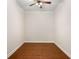 Versatile room with hardwood floors, ceiling fan, neutral paint; ideal for office or den at 1983 Silver Birch Se Dr, Smyrna, GA 30080