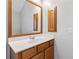 Bathroom with a large mirror and wood cabinets at 307 Jessica Way, Canton, GA 30114