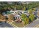 Aerial shot of a community clubhouse with a pool, showcasing its elegant design and serene setting at 307 Jessica Way, Canton, GA 30114