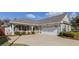Charming one story home with a concrete driveway and well manicured landscaping at 307 Jessica Way, Canton, GA 30114