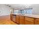 Kitchen island with double sink, lots of storage, with view to window and great room at 307 Jessica Way, Canton, GA 30114