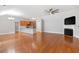 Spacious open concept living room and dining area with a gas fireplace at 307 Jessica Way, Canton, GA 30114