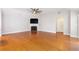 Spacious living room with hardwood floors and fireplace at 307 Jessica Way, Canton, GA 30114