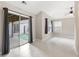Bright living room boasts sliding glass doors to outdoor patio at 307 Jessica Way, Canton, GA 30114