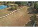 An aerial view of the community's soccer field, with walking path and surrounding mature trees at 307 Jessica Way, Canton, GA 30114