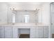 Large bathroom vanity with double sinks, a dressing area, and plenty of cabinet space at 3858 Vineyards Lake Nw Cir # U-19, Kennesaw, GA 30144