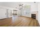 Spacious living room featuring vaulted ceilings, lots of light, and access to an outdoor patio at 3858 Vineyards Lake Nw Cir # U-19, Kennesaw, GA 30144